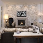 chic living room design with white and gray-washed accent brick wall