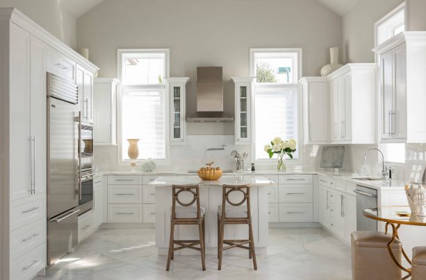 White cabinets greige walls