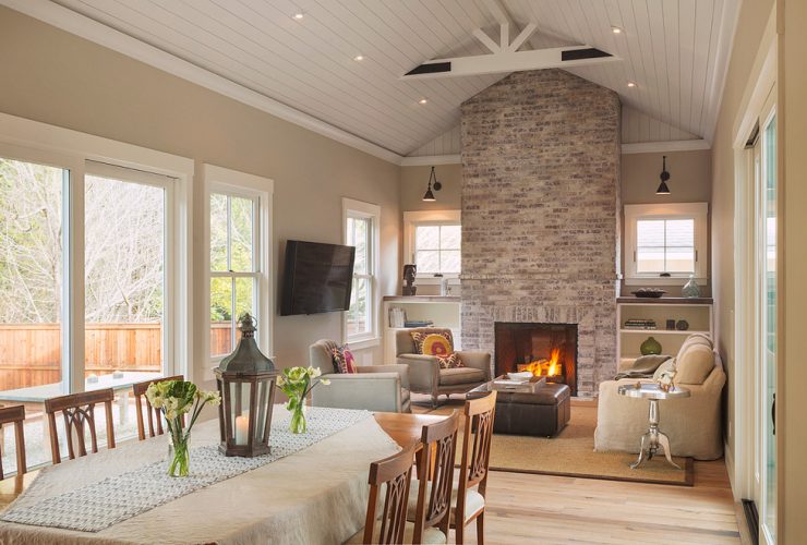 farmhouse living room with limewash brick fireplace