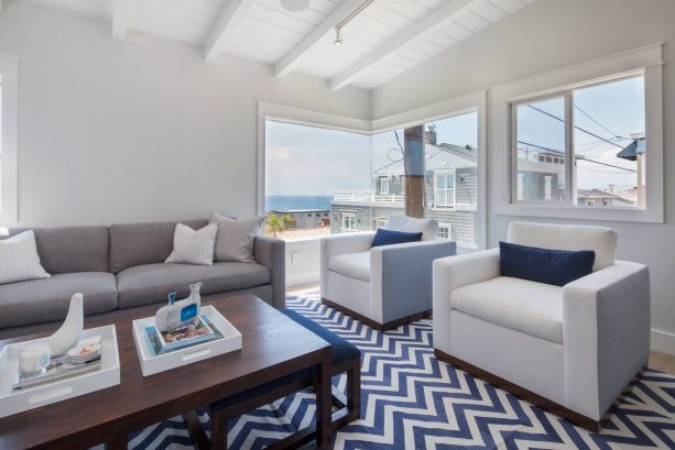 beach-style grey and blue living room with white and denim blue chevron rug