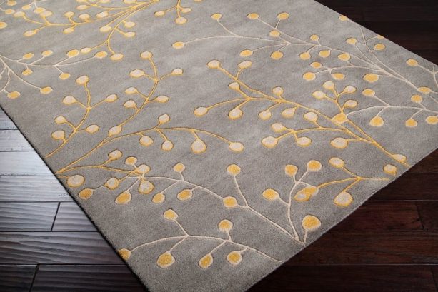 contemporary grey and yellow area rug with floral pattern