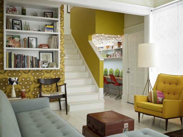 eclectic grey and yellow living room with corn yellow floral wall