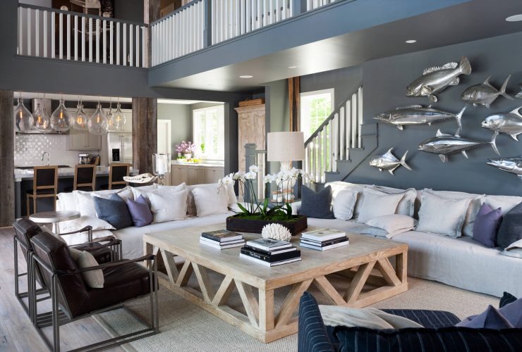 grey and blue open living room with a blue-grey wall