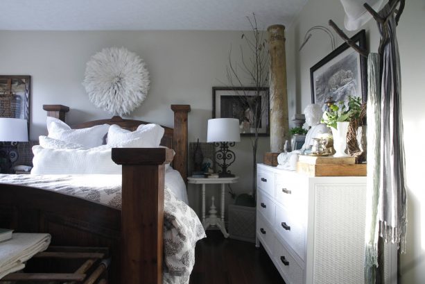 grey and white bedroom with wood brown wooden bed