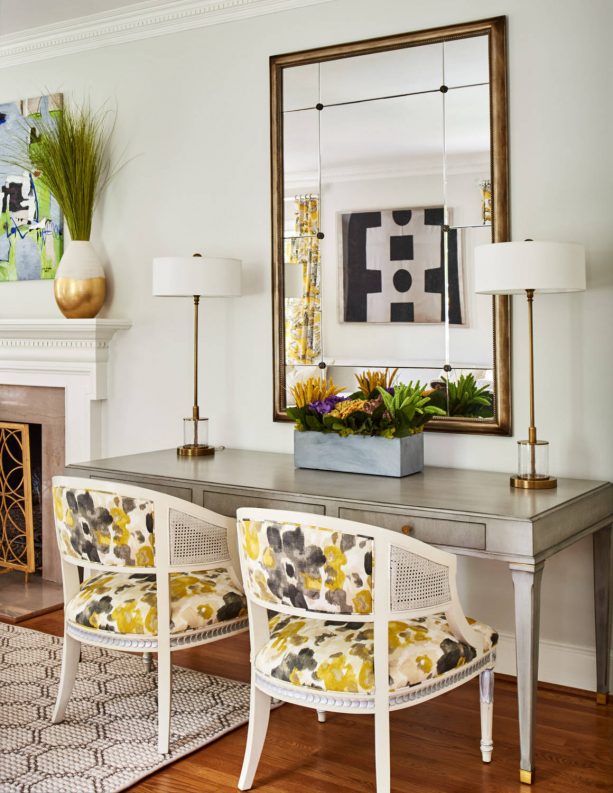 grey and yellow living room with yellow abstract floral-patterned chairs