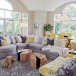 grey and yellow living room with yellow floral-patterned armless chair