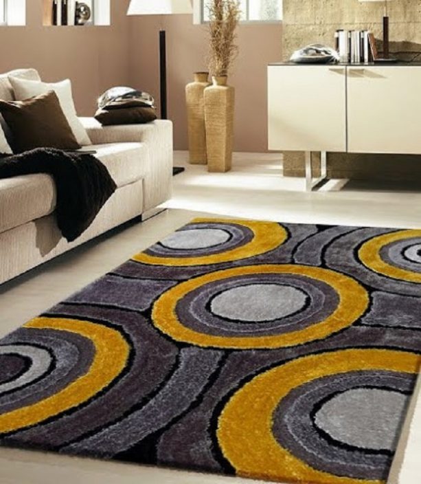 modern grey and yellow area rug with round pattern