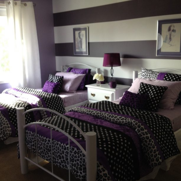 purple and grey bedroom with black accents