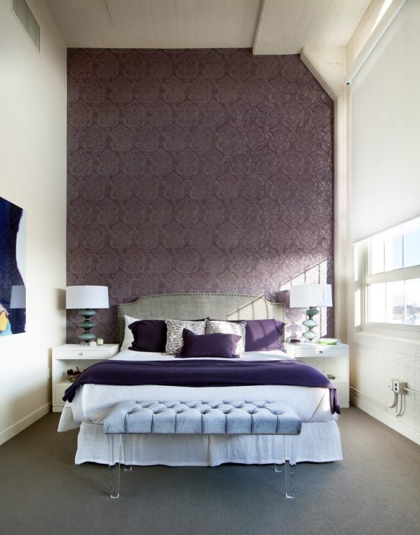 purple and grey bedroom with elegant-patterned purple accent wall