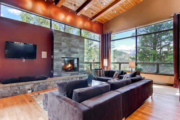 grey and brown living room with stone elements