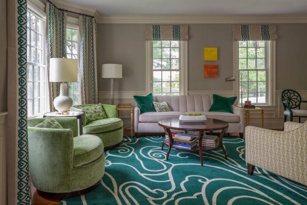 grey living room with abstract teal carpet