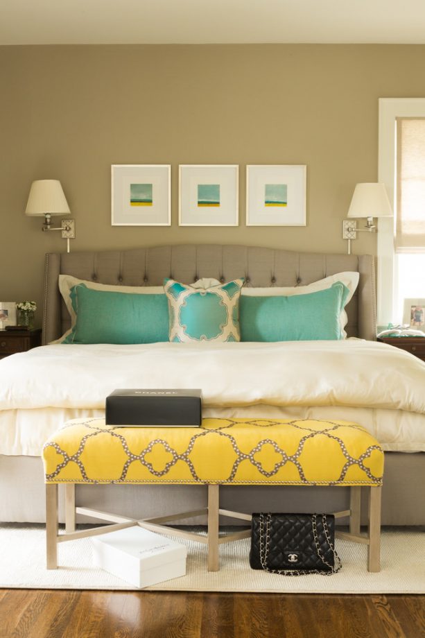 grey room with patterned yellow bench