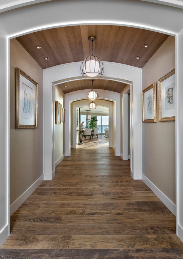 beige hallway with archways feature