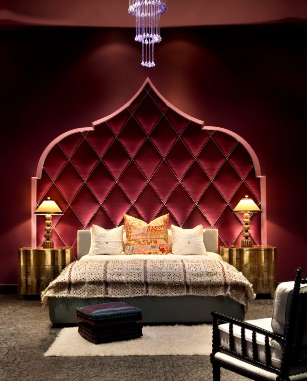 dark red bedroom with grey bedding set