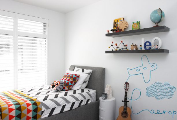 gray and red bedroom for a younger boy