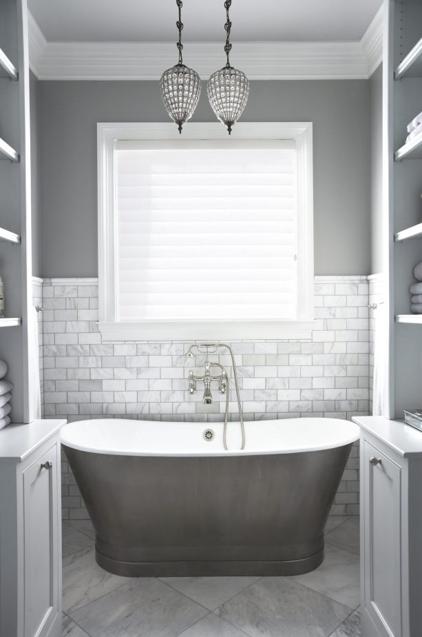 grey and white bathroom with gray tub