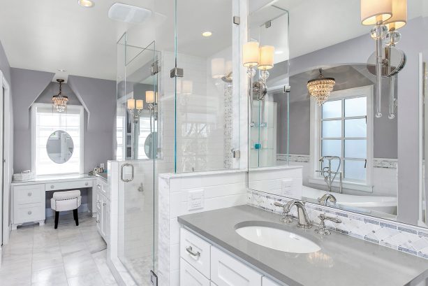 grey and white bathroom with grey quartz countertops