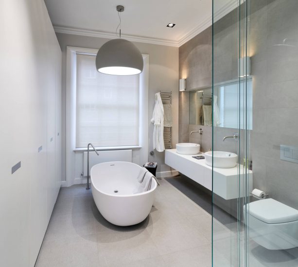 grey and white contemporary bathroom with bowl-style tub