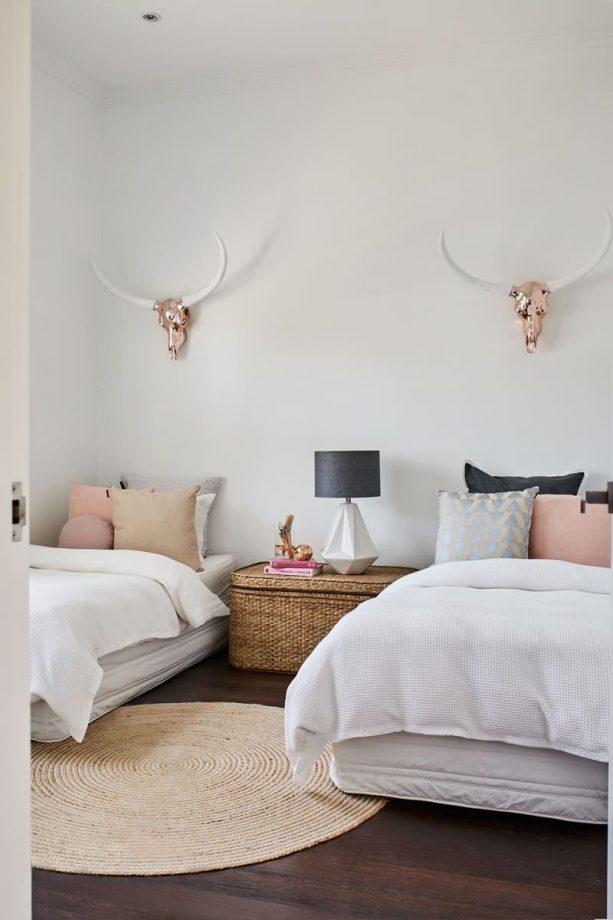 pink and grey bedroom with rose gold accents