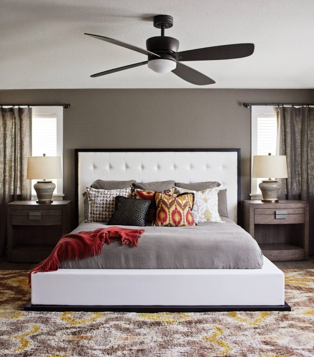 red and grey bedroom with white bed and white ceiling