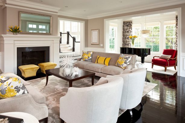 living room with grey, mustard, and white color scheme