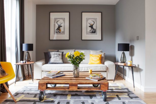 small transitional living room with grey and mustard theme