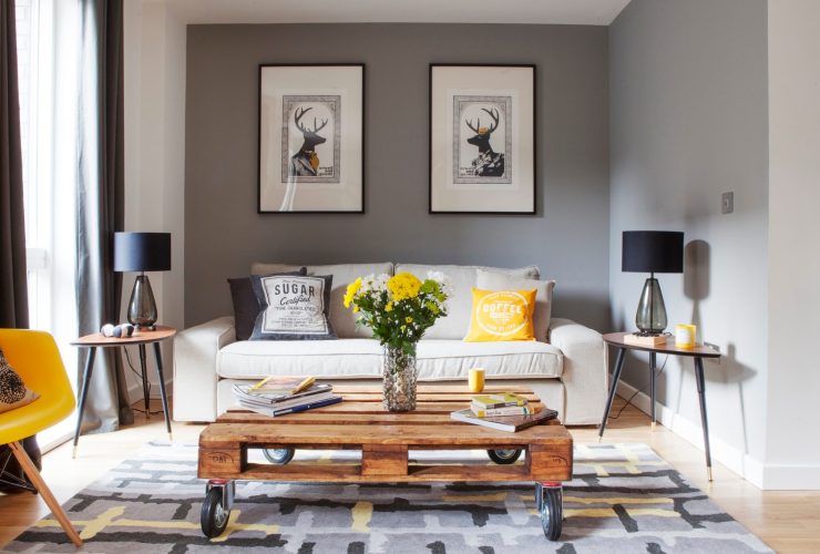 small transitional living room with grey and mustard theme