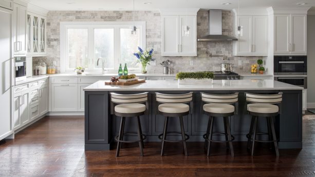 white shaker cabinets paired with charcoal island