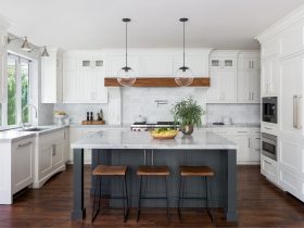 white shaker cabinets with dark wood accents