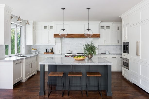 white shaker cabinets with dark wood accents