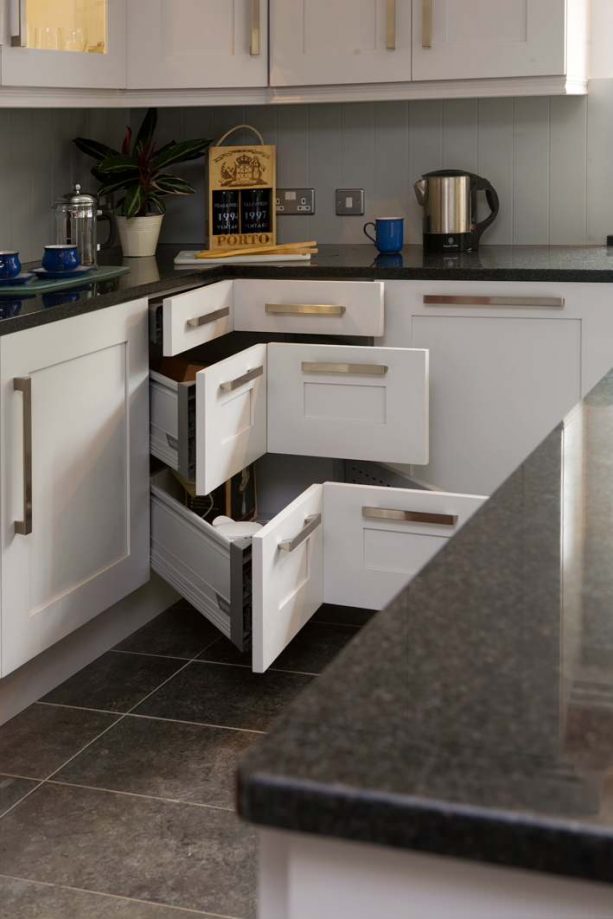 white shaker kitchen cabinets with corner cabinet drawers