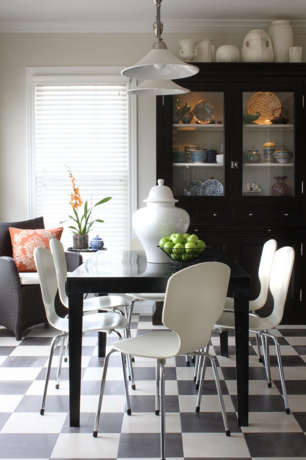 a traditional dining room with black and white vinyl floor