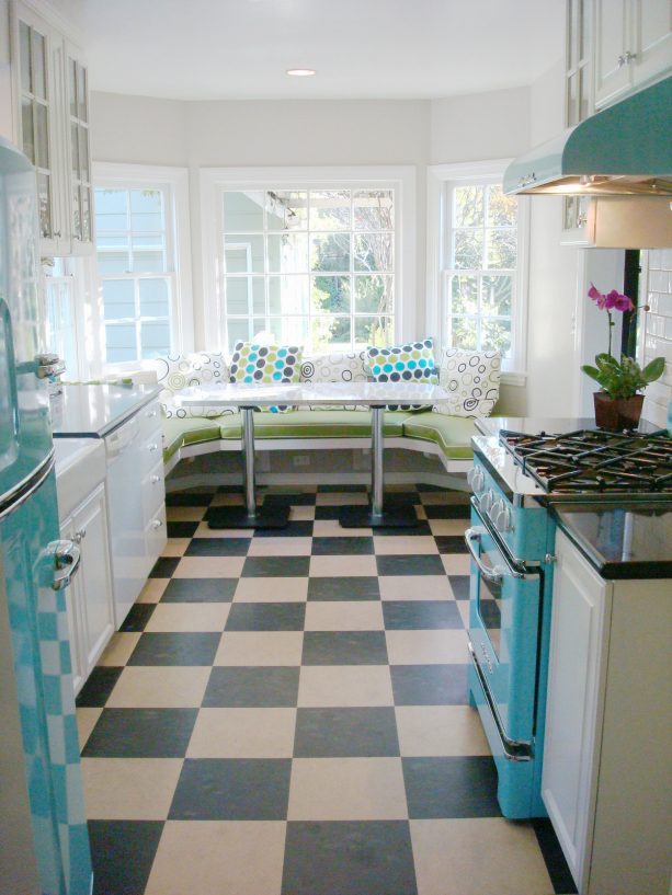 vintage-looking checkered linoleum floor in white and Tosca kitchen