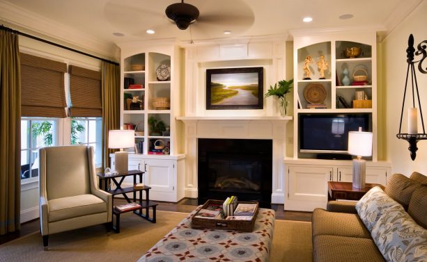 ceiling-to-floor curtains paired with roman shades