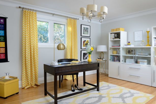 small home office window with bright yellow curtains