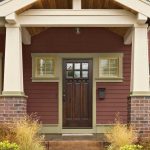 front door with brown stain and oyster tan-painted trim