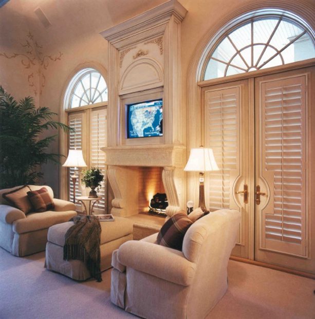 French doors covered with beige custom plantation shutters