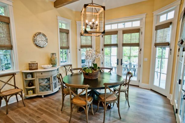 French doors treated with woven wood sheer roman shade