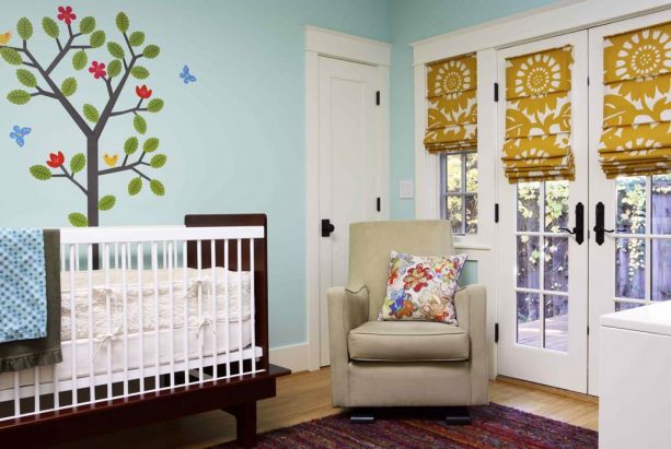 large-patterned slat front blackout roman shade for nursery French doors