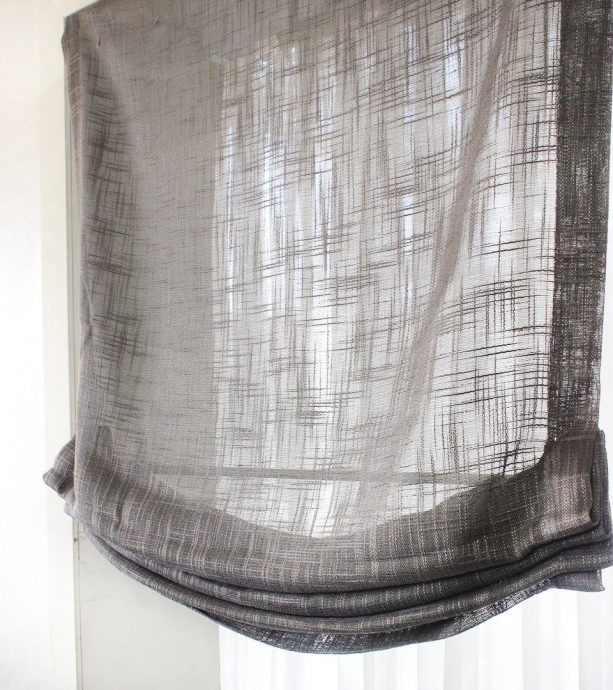 sheer grey linen relaxed roman shade to cover French door