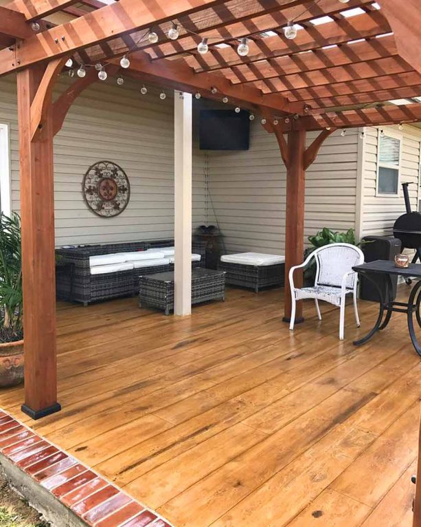 the use of concrete wood floor under a roofed patio