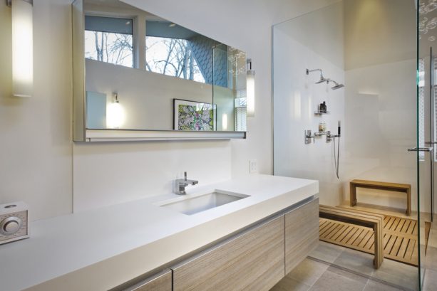 a modern shower room with Glacier White walls