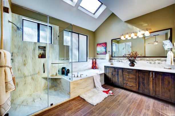 warm tone solid surface on the walls of a transitional shower