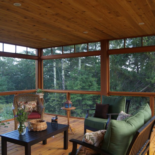 a contemporary porch with tongue and groove cedar ceiling