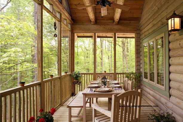 a log house porch with tongue and groove ceiling