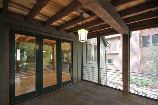 a masculine-looking porch with clear poplar tongue and groove ceiling