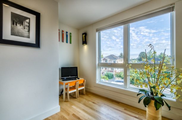 a small leveled area near the stair used as a computer room