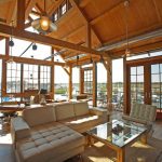an eclectic living room with tongue and groove roof deck from Douglas fir material