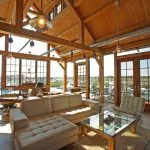 an eclectic living room with tongue and groove roof deck from Douglas fir material