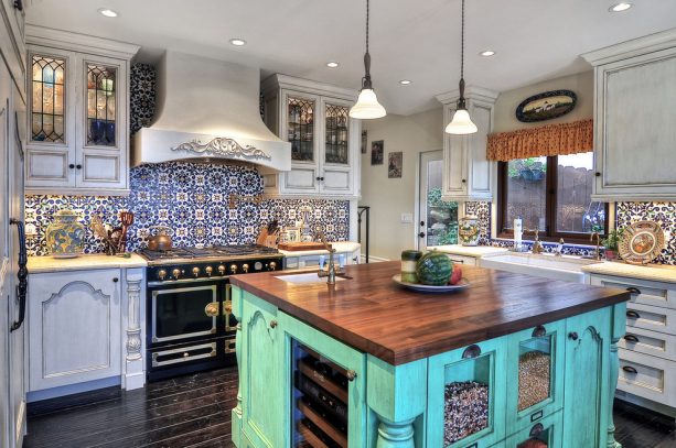 turquoise kitchen island with wooden top